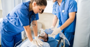 Nurse performing chest compressions - HealthStream&#39;s Quality &amp; Safety Solution